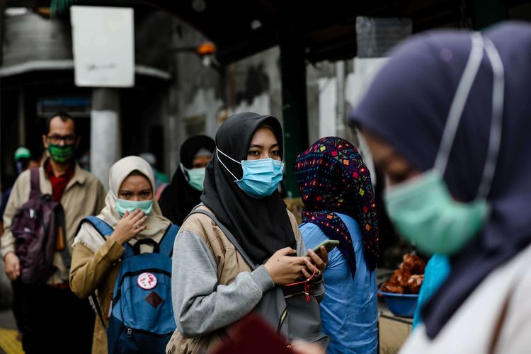 Ilustrasi Aturan Memakai masker [kompas]