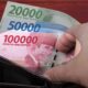 Gambar uang rupiah pecahan seratus ribu