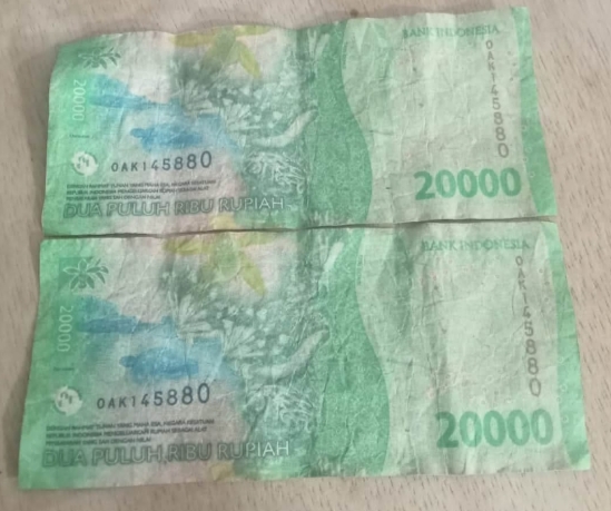 Ilustrasi uang Rp 20.000 [poroskeadilan]